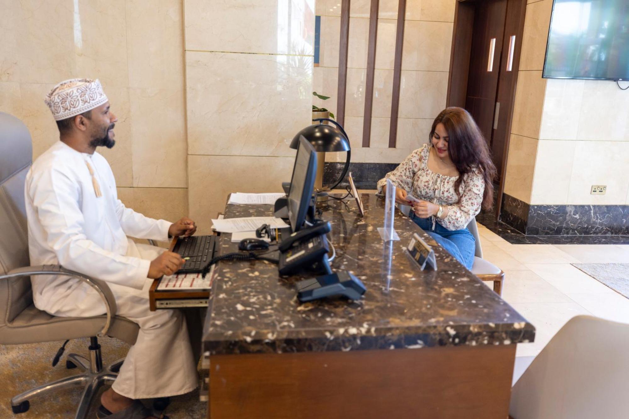 Millennium Resort Salalah Exterior foto A hotel receptionist in Oman