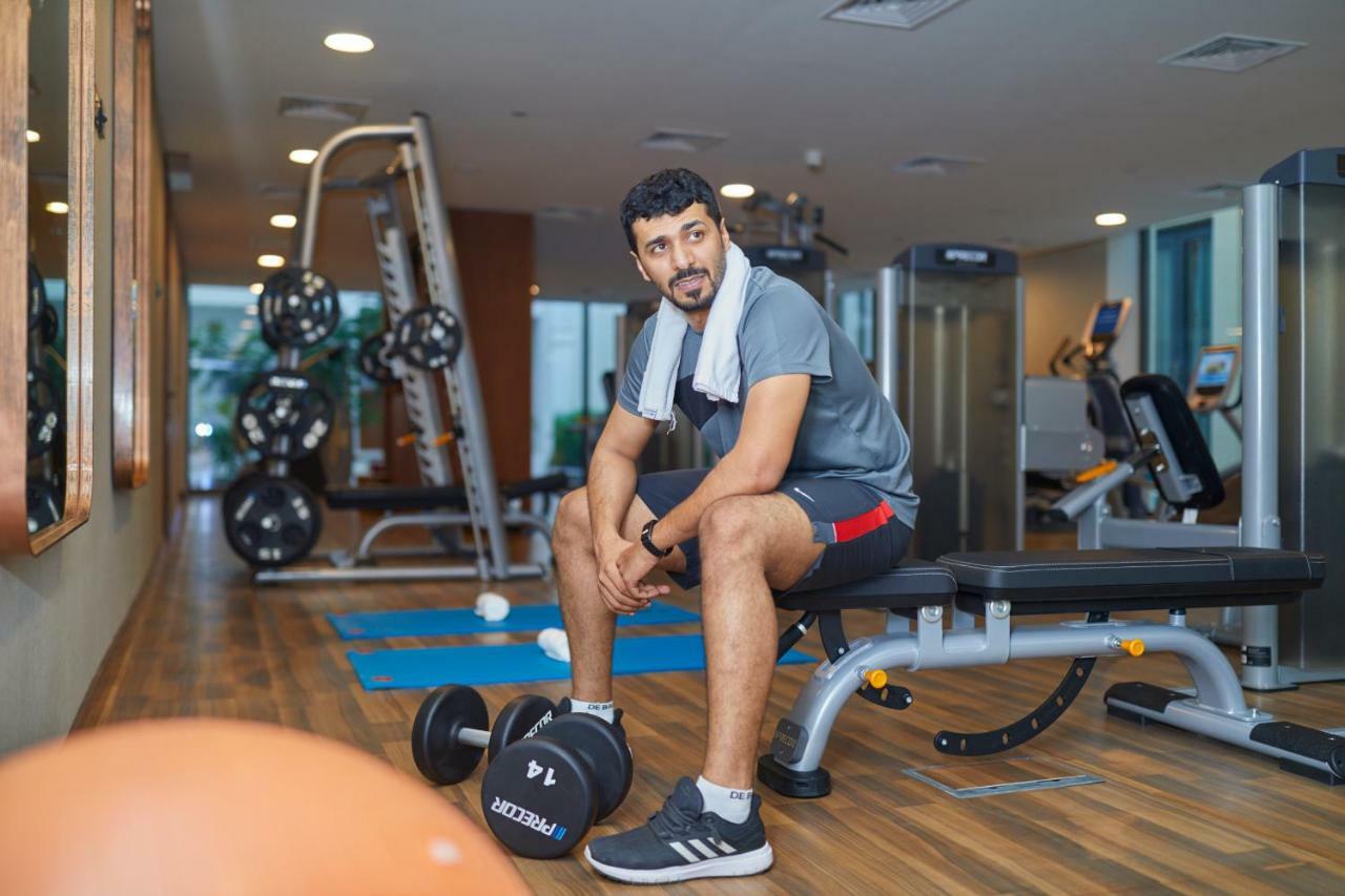 Millennium Resort Salalah Exterior foto A man in a gym